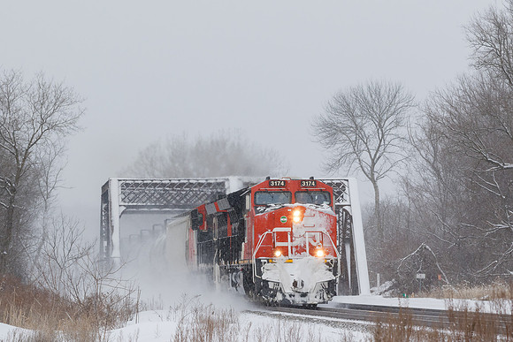 CN 3174 (ET44AC) leads K614-34  on 02-01-21
